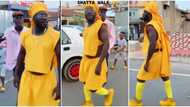 Ras Nene: Ghanaian comedian walks confidently in yellow outfit in video, gets many laughing