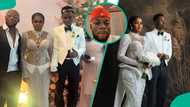 Man who faced backlash for holding Jarvis' hand at her white wedding claps back at critics