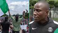 Jubilation as Nigerians raise N1.8m for protester who spoke about 13-year-old programmer son’s needs