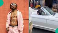 Video of Asake cruising around in his old school Camero Impala trends: "Lungu boy"