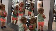 Baby laughs hard as she sees herself in a mirror, kid looks at it again and screams happily in viral video