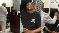 Drama as boss catches male employee sleeping with mouth open while on duty at office, video trends