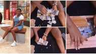 Nigerian lady breaks her piggy bank after one month, finds over N1m, video sparks huge reactions
