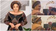Nollywood's Toyin Abraham rains cash on veteran musician King Sunny Ade as he sings her praises at an event