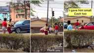 Young lady tells traffic officer she likes him, gifts him rose for Val and cash, he blushes in cute video