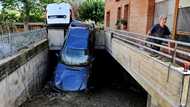 'Like a waterfall': Italy storms kill 10, spark climate debate