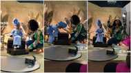 "She is well-trained": Kid dressed in iro & buba for photoshoot behaves like adult, helps photographer