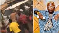 He'll go back to the trenches: Reactions as video shows moment Portable rained money on fans on the street