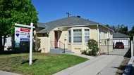 June US home sales slower than expected, prices hit fresh high