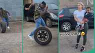 Man living abroad finds old car tyre, plays with it like a child, Oyinbo wife watches with amazement