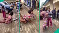Lady rolls on floor as she receives appointment letter for dream job 18 years after graduation