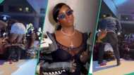 "Crazy people full Warri": Clip of a fan giving Tiwa Savage an aggressive hug on stage goes viral