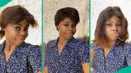 Mixed reactions as lady shows off wigs her man gave her for 'Detty December'