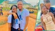 NYSC member slots ring into the hand of another at CDS, engages her in style