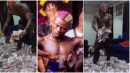 “I no be upcoming artist O”: Portable says as he flaunts river of money he was sprayed at a show, video trends