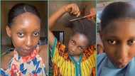 Nigerian lady cuts her long hair with scissors as price of attachment hits N6k, video trends