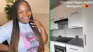 Lady gives her parents' kitchen modern makeover, installs fridge, induction cooker, father dances