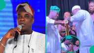Video of KWAM 1 refilling his famous water flask before performing at an event triggers reactions