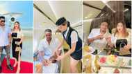 Adorable photos of a Nigerian man and his young pretty Oyinbo wife as they alighted a flight cause huge stir