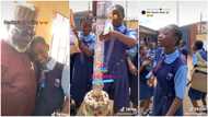Rich Nigerian dad surprises his daughter at school for her birthday, brings cake with N100 notes inside