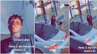 "That girl na just mumu": Young man videos lady washing his car as he and his friends laugh at her