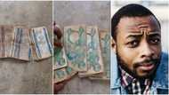 Cash scarcity: Nigerian man brings out old Naira notes printed over 15 years ago, video goes viral on TikTok
