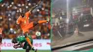 Lady caught hiding her Nigerian jersey after Super Eagles AFCON final loss, video goes viral online