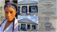 Lady builds house, decorates veranda & pillars with tiles, shares photos of land documents