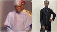 Reactions as Ezra Olubi’s outfit leaves President Buhari stunned as he receives national award