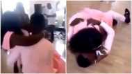 Drama as man crashes to the floor while trying to carry wife up during wedding ceremony (video)