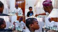 Gov Sanwo-Olu battles 10-year-old chess champion in friendly game, shares cute photos as it ends in stalemate