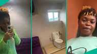 Lady confused after finding long sofa in Abuja restaurant's toilet, shares video online
