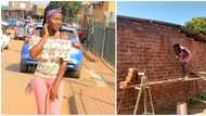 Pretty lady builds her house and plasters it herself, photos spark huge reactions on social media