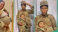 Cute video as beautiful female soldier gives birth, wraps her baby in military camouflage