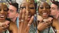 Black lady goes crazy as oyinbo man accepts proposal to be her lover, kisses her in viral video