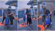 "God when": Mum hugs son tightly on her knees in cute video as he returns to Nigeria after 6 years in Europe