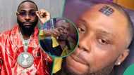 "Even Davido sef go shock": Man tattoos 30BG permanently on his forehead, video goes viral