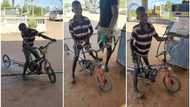 Boy btorms filling station in strange-looking bicycle, buys fuel in rubber tank & rides away in stunning video