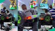Creative barber uses car-shaped chair, television, to draw children to his shop, video trends