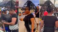 "Na this hairstyle I wan do next": Reactions as lady storms market with unique hairdo