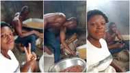 "God blessed me with most supportive husband": Nigerian lady praises lover who helps her fry using firewood