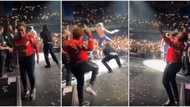E dey body: Fans gush as Burna Boy’s mum dances like a rockstar on stage during son's performance in Ireland