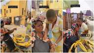 Emotional moment lady surprises roasted plantain seller with wad of N500 notes, woman breaks down in tears