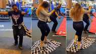 "My first client": Overjoyed hairdresser removes her shirt, lays it on ground for customer to walk on in video