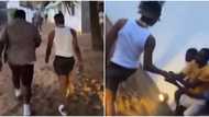 "Una wan break my popsi hand?" Wizkid casually gifts fans money at beach during music video shoot