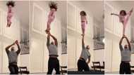 Little girl displays amazing skills as dad throws her in the air, many react to viral video