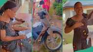 Nigerian mother happily hugs her son who bought her brand new motorcycle