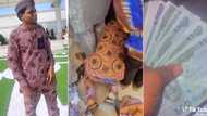 "I picked plenty cash": Man who attended Wizkid mother's funeral flaunts wads of cash, video trends