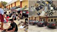 Clampdown in Enugu as EFCC arrests 30 Yahoo boys, laptops, cars, other items recovered (photos)