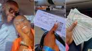 "Loyalty no dey pay": Lady who cheated on boyfriend flaunts dollars and lavish gifts, video stuns many